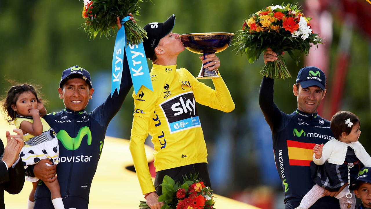 Froome cruises into Paris to win his second Tour de France